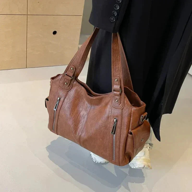 Torebka na ramię damska – elegancka torebka ze skóry z regulowanym paskiem i pojemnym designem