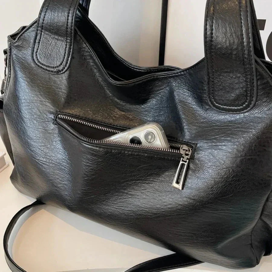 Torebka na ramię damska – elegancka torebka ze skóry z regulowanym paskiem i pojemnym designem