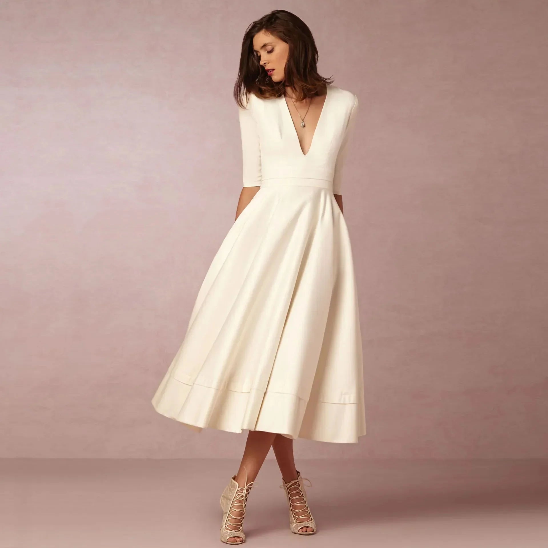 Women's midi dress with V-neck and elbow-length sleeves
