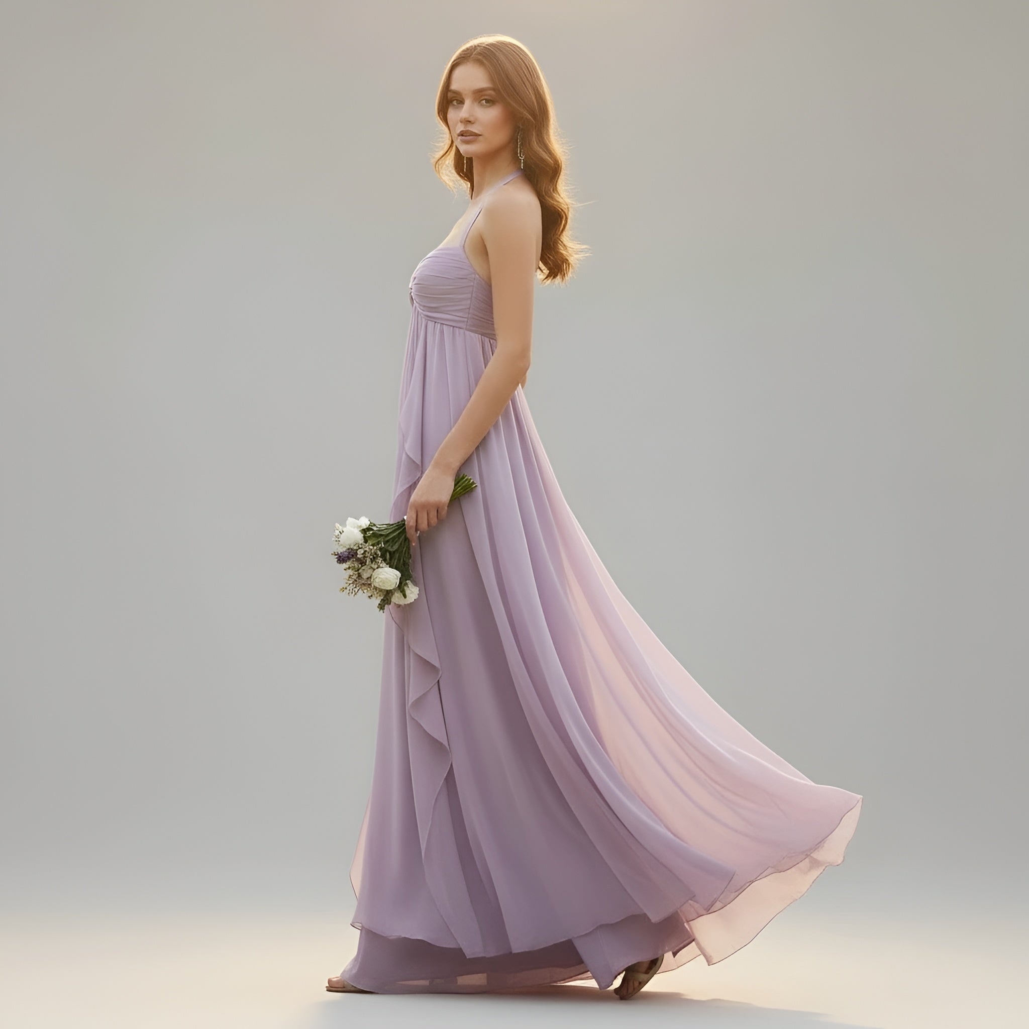 Elegancka długa sukienka damska z ramiączkami halter i zwiewną spódnicą na wieczorne uroczystości