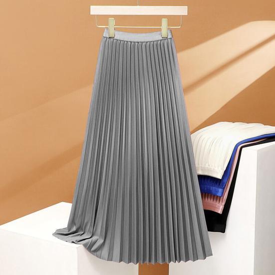 Long pleated elasticized skirt with high waist, elegant and comfortable, perfect for a sophisticated and feminine look.