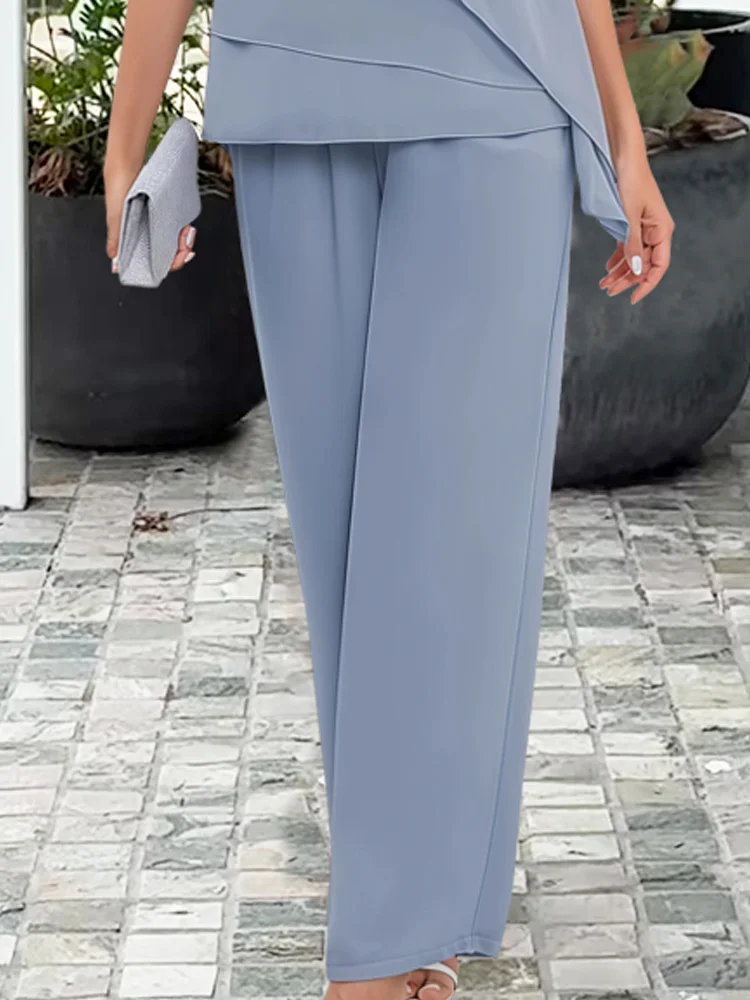 Elegantní dámský komplet s vrstvenou blůzou a palazzo kalhotami