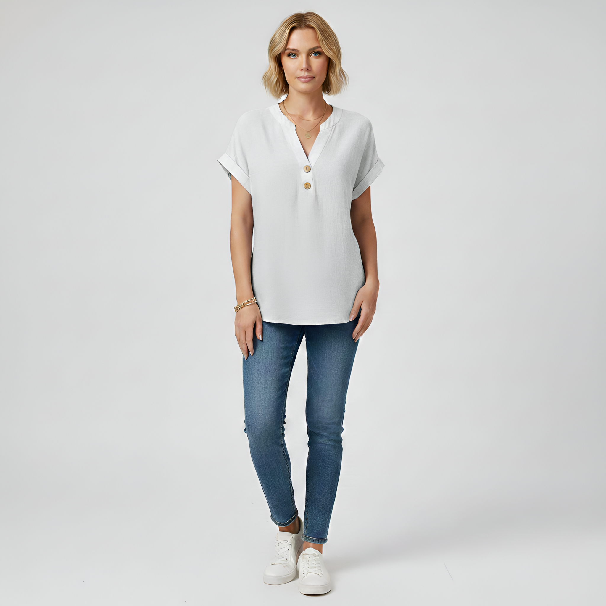 Blusa donna maniche corte in cotone con scollo a V e bottoni