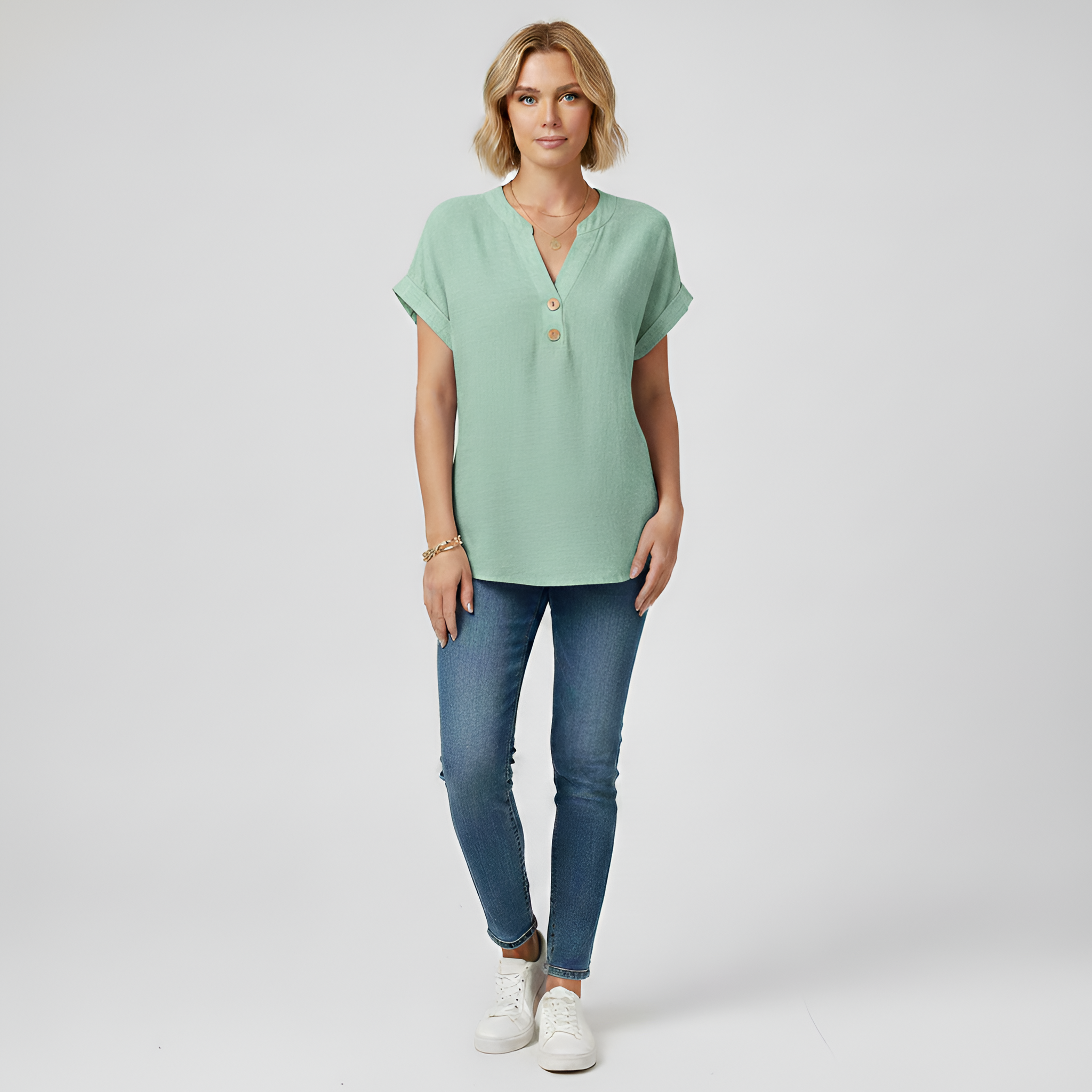 Blusa donna maniche corte in cotone con scollo a V e bottoni