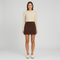 Pull court femme en maille avec torsades et jupe mini taille haute