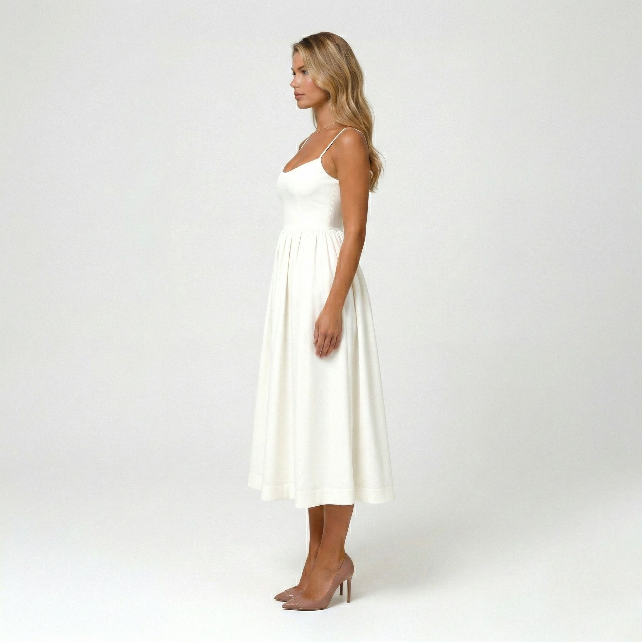 Vestido midi elegante para mulher com alças finas e saia ampla fluida