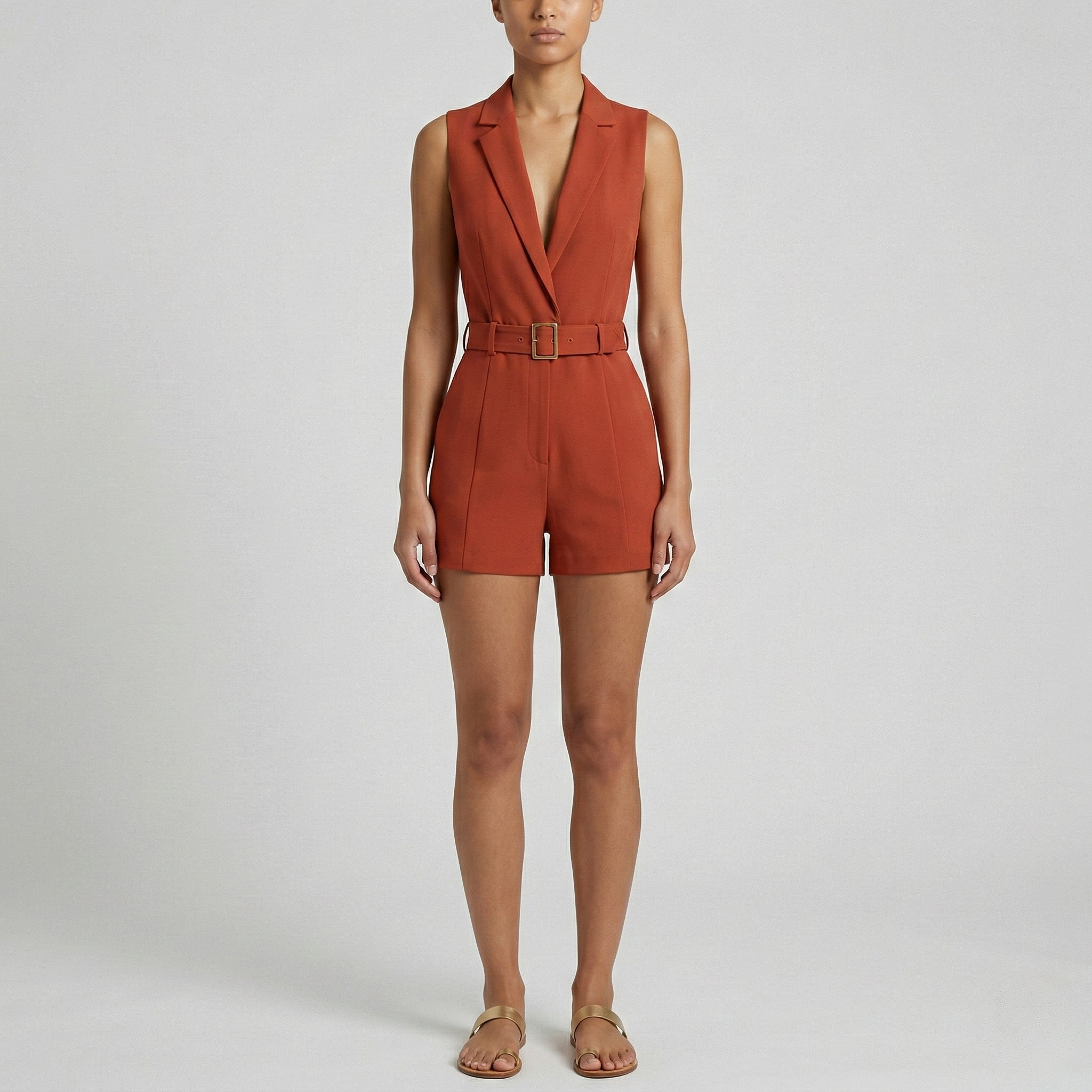 Tuta intera donna corta elegante con cintura e scollo a V senza maniche